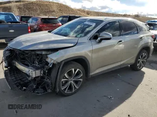 2021 Lexus RX with VIN 2T2HGMDA4MC062808, listed as a Copart auction lot 87157974 with 32,804 mi miles and Salvage Title. Bid and sale history available at carsss.com. Image 1.