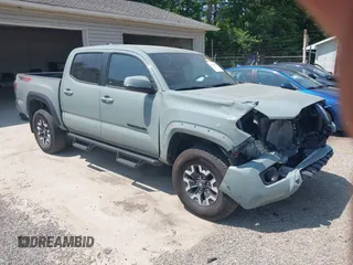 2023 Toyota Tacoma SR with VIN 3TMCZ5ANXPM630867, listed as a IAAI auction lot 42367073 with 31,249 mi miles and . Bid and sale history available at DreamBid. Image 1.