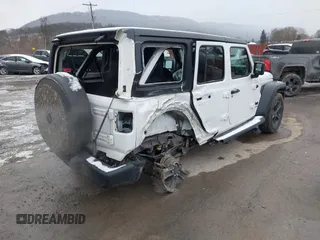 2021 Jeep Wrangler Unlimited Sport Altitude with VIN 1C4HJXDG2MW791599, listed as a IAAI auction lot 41235427 with 47,220 mi miles and . Bid and sale history available at DreamBid. Image 6.