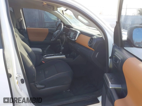 2017 Toyota Tacoma SR with VIN 5TFAX5GN4HX092764, listed as a IAAI auction lot 41708434 with 114,607 mi miles. Bid and sale history available at carsss.com. Image 5.