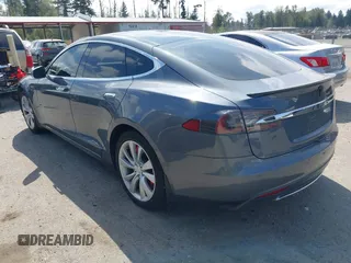 2014 Tesla Model S 60 with VIN 5YJSA1H18EFP38078, listed as a IAAI auction lot 42748619 with 159,285 mi miles and . Bid and sale history available at DreamBid. Image 3.