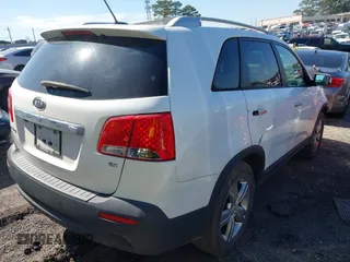 2013 Kia Sorento EX with VIN 5XYKUCA65DG407345, listed as a IAAI auction lot 41653071 with 169,208 mi miles. Bid and sale history available at carsss.com. Image 4.