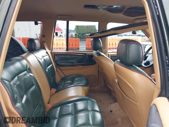 1996 Jeep Grand Cherokee Limited with VIN 1J4GZ78S0TC235692, listed as a IAAI auction lot 41945617 with Not provided miles and . Bid and sale history available at DreamBid. Image 8.