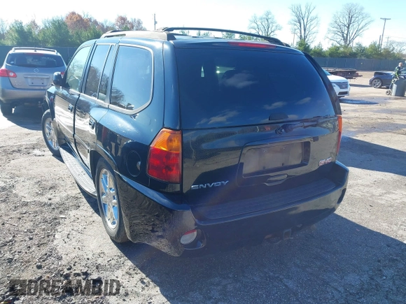 2006 GMC Envoy Denali with VIN 1GKET63M462257064, listed as a IAAI auction lot 40793921 with 179,304 mi miles. Bid and sale history available at carsss.com. Image 3.
