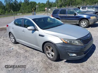 2014 Kia Optima LX with VIN 5XXGM4A77EG285193, listed as a IAAI auction lot 42270051 with 244,743 mi miles and . Bid and sale history available at DreamBid. Image 1.