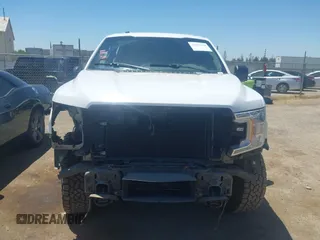 2018 Ford F-150 XL with VIN 1FTEW1EP8JKF82063, listed as a IAAI auction lot 42299414 with 153,706 mi miles and . Bid and sale history available at DreamBid. Image 13.