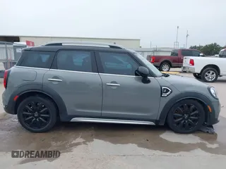 2018 MINI Countryman Cooper S z VIN WMZYT3C35J3E93291, wystawiony jako IAAI lot #41281432 z przebiegiem 58 774 mil mil oraz . Historia ofert i sprzedaży dostępna na DreamBid. Obrazek 13.
