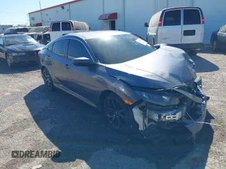 2021 Honda Civic Sedan Sport with VIN 19XFC2F81ME000807, listed as a IAAI auction lot 41742824 with 139,752 mi miles. Bid and sale history available at carsss.com. Image 1.