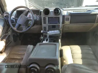 2003 Hummer H2 with VIN 5GRGN23U83H134284, listed as a Copart auction lot 70259154 with 0 mi miles and Salvage Title. Bid and sale history available at carsss.com. Image 8.