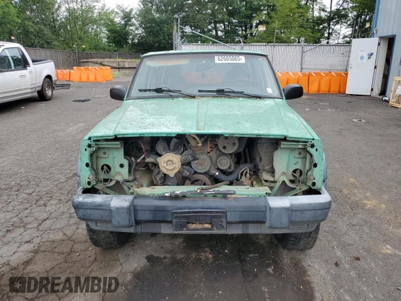 1999 Jeep Cherokee SE with VIN 1J4FF28SXXL641556, listed as a Copart auction lot 62605065 with Not provided miles and Salvage title. Bid and sale history available at DreamBid. Image 5.