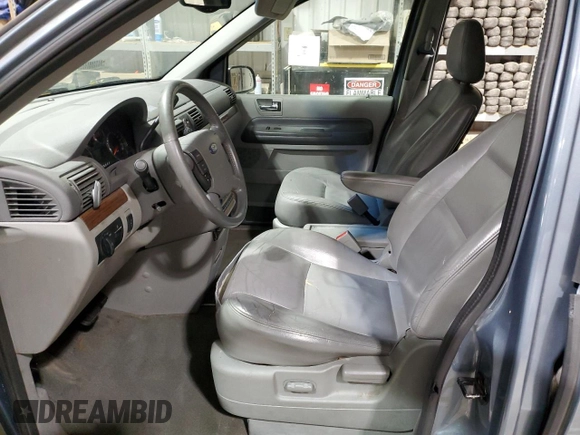 2004 Ford Freestar Limited z VIN 2FMDA58254BA54752, wystawiony jako Copart lot #89195235 z przebiegiem Nie podano mil oraz Szkoda całkowita • Salvage title. Historia ofert i sprzedaży dostępna na DreamBid. Obrazek 7.