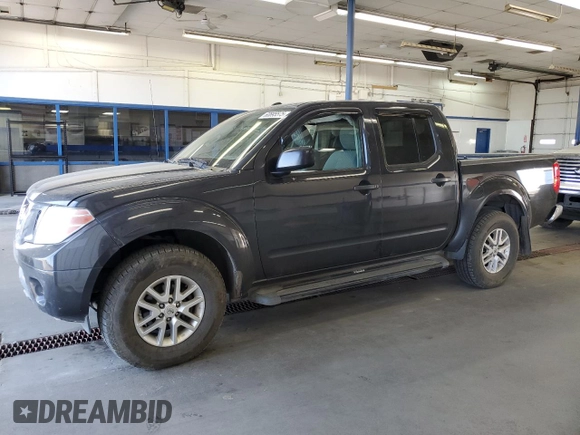 2014 Nissan Frontier SV with VIN 1N6AD0EV9EN710020, listed as a Copart auction lot 60895575 with 125,090 mi miles and Salvage title. Bid and sale history available at DreamBid. Image 1.