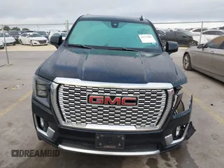 2021 GMC Yukon Denali with VIN 1GKS2DKL3MR308321, listed as a IAAI auction lot 41771365 with 63,415 mi miles. Bid and sale history available at carsss.com. Image 13.