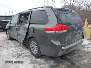 2012 Toyota Sienna XLE AAS with VIN 5TDYK3DCXCS206978, listed as a IAAI auction lot 41374061 with 307,827 mi miles and . Bid and sale history available at DreamBid. Image 3.