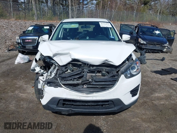 2016 Mazda CX-5 Sport with VIN JM3KE2BY9G0887110, listed as a IAAI auction lot 41761039 with 86,624 mi miles. Bid and sale history available at carsss.com. Image 13.
