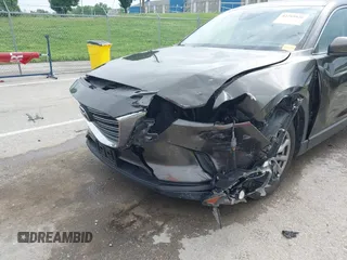 2017 Mazda CX-9 Touring z VIN JM3TCACY7H0129335, wystawiony jako IAAI lot #42289926 z przebiegiem 60 425 mil mil oraz . Historia ofert i sprzedaży dostępna na DreamBid. Obrazek 6.