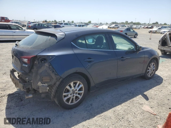 2015 Mazda 3 i Grand Touring z VIN 3MZBM1M72FM145070, wystawiony jako Copart lot #58419525 z przebiegiem 61 255 mil mil oraz Szkoda całkowita • Salvage title. Historia ofert i sprzedaży dostępna na DreamBid. Obrazek 3.