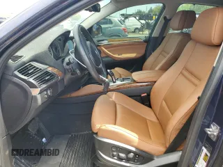 2011 BMW X6 50i with VIN 5UXFG8C51BLZ95772, listed as a Copart auction lot 65733764 with 94,467 mi miles and Salvage Title. Bid and sale history available at carsss.com. Image 7.