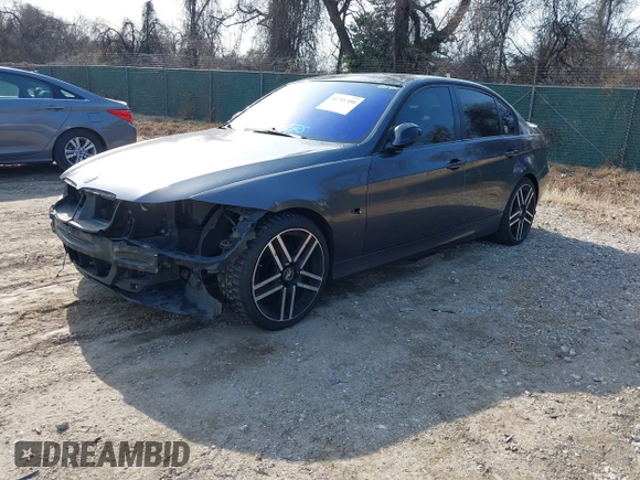 2007 BMW 3 Series 328xi with VIN WBAVC93587K031632, listed as a IAAI auction lot 41711350 with 184,703 mi miles. Bid and sale history available at carsss.com. Image 2.