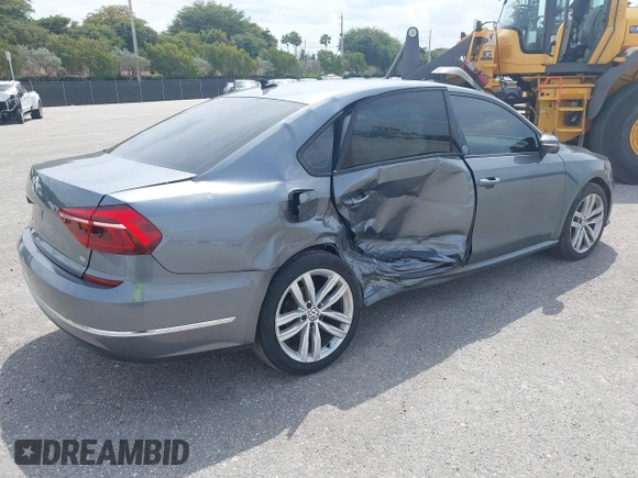 2019 Volkswagen Passat 2.0T Wolfsburg Edition with VIN 1VWLA7A35KC011084, listed as a IAAI auction lot 40385111 with 81,119 mi miles. Bid and sale history available at carsss.com. Image 4.