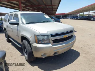 2013 Chevrolet Suburban LT with VIN 1GNSKJE70DR127208, listed as a IAAI auction lot 42285279 with 295,930 mi miles and . Bid and sale history available at DreamBid. Image 1.