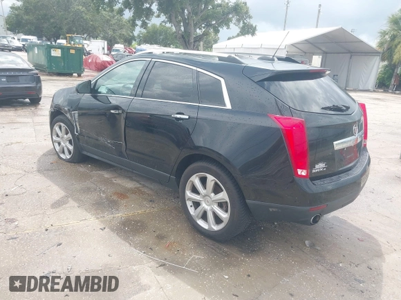 2015 Cadillac SRX Premium Collection with VIN 3GYFNGE30FS634363, listed as a IAAI auction lot 42672064 with 146,821 mi miles and . Bid and sale history available at DreamBid. Image 3.