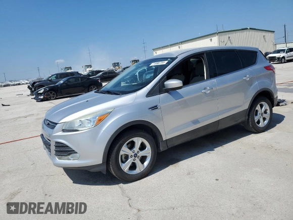 2015 Ford Escape SE with VIN 1FMCU0GX5FUC43739, listed as a Copart auction lot 71996704 with 56,561 mi miles and Salvage Title. Bid and sale history available at carsss.com. Image 1.