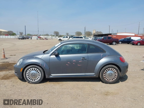 2014 Volkswagen Beetle 2.5L with VIN 3VWJX7AT7EM608634, listed as a IAAI auction lot 41783090 with 139,106 mi miles and . Bid and sale history available at DreamBid. Image 14.