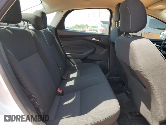 2018 Ford Focus SE with VIN 1FADP3FE9JL264664, listed as a Copart auction lot 61726905 with 28,471 mi miles and Salvage title. Bid and sale history available at DreamBid. Image 10.