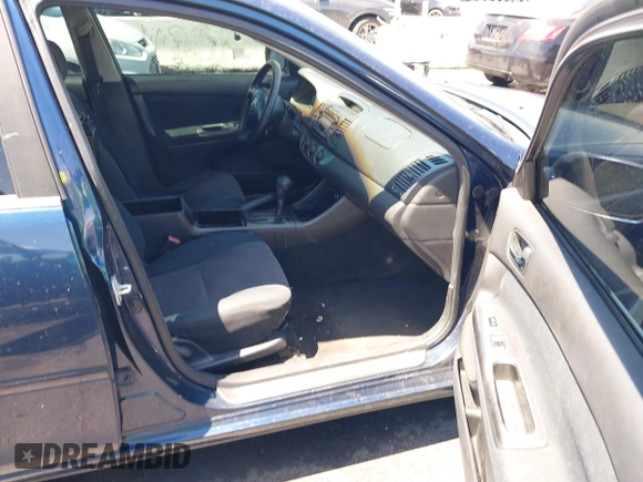 2003 Toyota Camry LE with VIN JTDBE32K130243265, listed as a IAAI auction lot 42145871 with Not Provided miles and . Bid and sale history available at DreamBid. Image 5.
