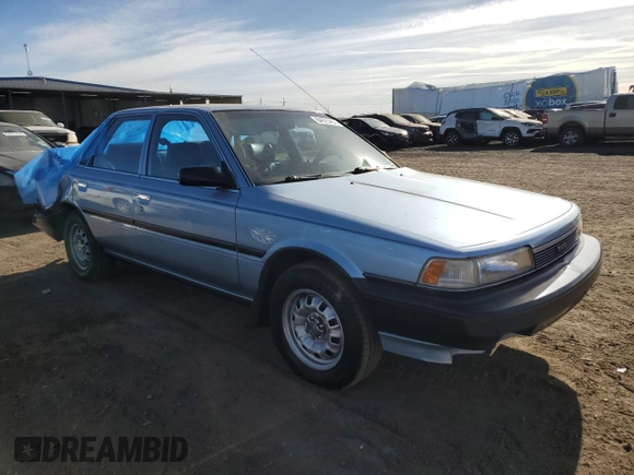1990 Toyota Camry z VIN 4T1SV24E0LU137556, wystawiony jako Copart lot #84628404 z przebiegiem 247 203 mil mil oraz Czysty tytuł • Clean title. Historia ofert i sprzedaży dostępna na DreamBid. Obrazek 4.
