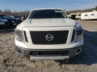 2017 Nissan Titan Pro-4X z VIN 1N6BA1F42HN571085, wystawiony jako Copart lot #49859795 z przebiegiem 163 835 mil mil oraz Tytuł czysty. Historia ofert i sprzedaży dostępna na DreamBid. Obrazek 5.