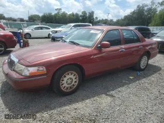 2003 Mercury Grand Marquis GS Convenience with VIN 2MEFM74W73X704870, listed as a Copart auction lot 71243934 with 120,807 mi miles and Salvage Title. Bid and sale history available at carsss.com. Image 1.
