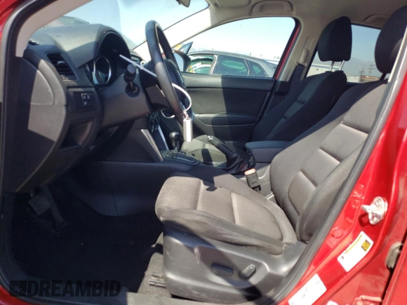 2014 Mazda CX-5 Touring with VIN JM3KE2CY9E0356050, listed as a Copart auction lot 65470674 with 70,400 mi miles and Salvage Title. Bid and sale history available at DreamBid. Image 7.