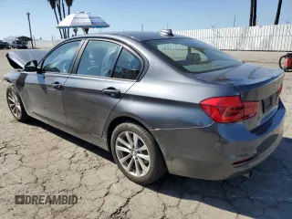 2018 BMW 3 Series 320i with VIN WBA8A9C51JAD26901, listed as a Copart auction lot 52609285 with 36,344 mi miles and Salvage Title. Bid and sale history available at carsss.com. Image 2.