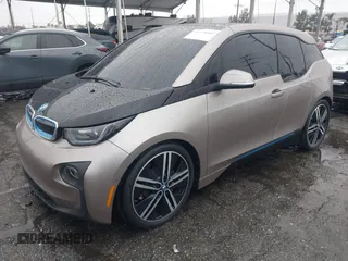 2014 BMW i3 with VIN WBY1Z4C58EV276329, listed as a IAAI auction lot 41570602 with 87,925 mi miles and . Bid and sale history available at DreamBid. Image 2.