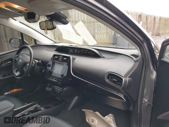 2019 Toyota Prius L Eco z VIN JTDKARFU8K3085918, wystawiony jako IAAI lot #41107891 z przebiegiem 166 295 mil mil oraz . Historia ofert i sprzedaży dostępna na DreamBid. Obrazek 5.