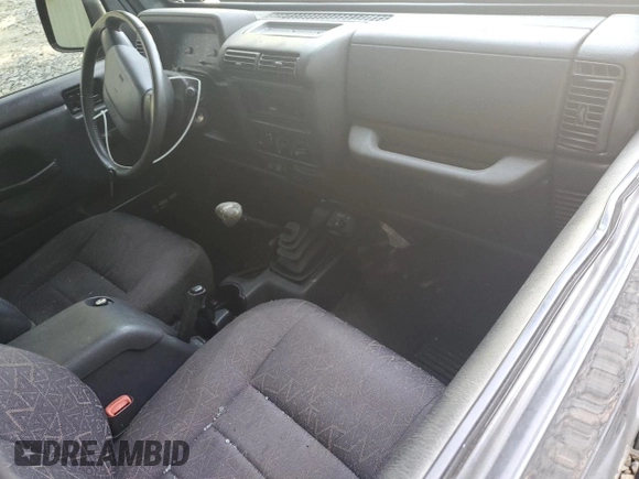2002 Jeep Wrangler Sport with VIN 1J4FA49S72P715946, listed as a Copart auction lot 70884114 with 114,964 mi miles and Clean Title. Bid and sale history available at carsss.com. Image 8.