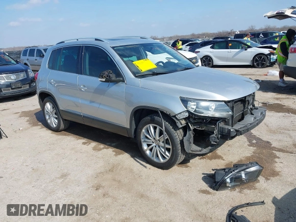 2013 Volkswagen Tiguan SE with VIN WVGAV7AX4DW545658, listed as a IAAI auction lot 41523168 with 188,729 mi miles and . Bid and sale history available at DreamBid. Image 1.