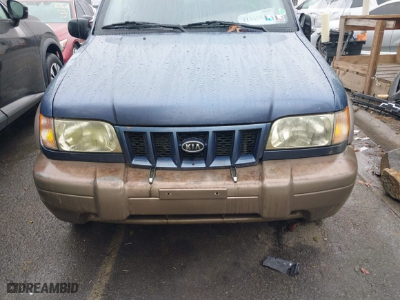 2002 Kia Sportage with VIN KNDJB723925161368, listed as a IAAI auction lot 41045568 with 168,167 mi miles. Bid and sale history available at carsss.com. Image 6.