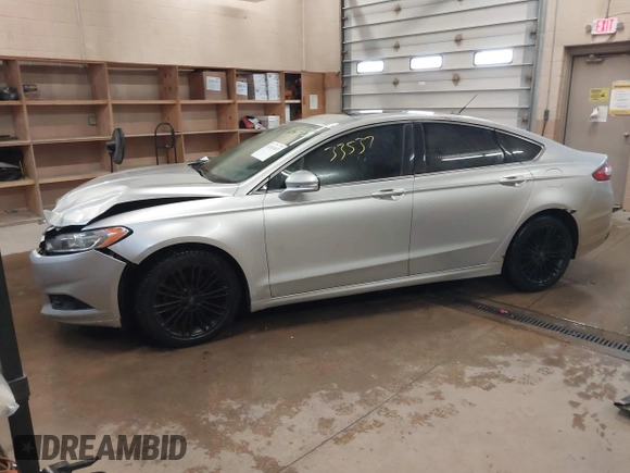 2014 Ford Fusion SE with VIN 3FA6P0H90ER290746, listed as a IAAI auction lot 41333537 with 148,755 mi miles. Bid and sale history available at carsss.com. Image 2.