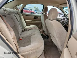 2006 Ford Taurus SE с VIN 1FAFP53U36A203006, выставлен на аукционе Copart как лот 63012895 с пробегом Не указан миль и Списание • Salvage title. История ставок и продаж доступна на DreamBid. Изображение 10.