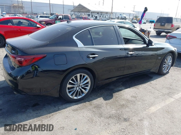 2018 Infiniti Q50 Luxe with VIN JN1EV7AP9JM358741, listed as a IAAI auction lot 42644098 with 101,553 mi miles and . Bid and sale history available at DreamBid. Image 4.
