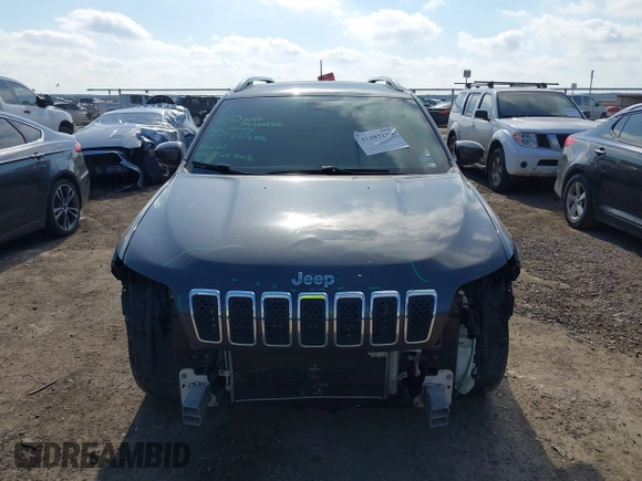 2020 Jeep Cherokee Altitude with VIN 1C4PJLLB5LD580742, listed as a IAAI auction lot 41483128 with 77,127 mi miles. Bid and sale history available at carsss.com. Image 13.