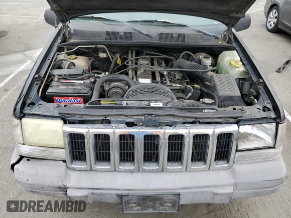 1998 Jeep Grand Cherokee Laredo with VIN 1J4FX58S0WC305329, listed as a Copart auction lot 76777264 with 251,942 mi miles and Clean Title. Bid and sale history available at carsss.com. Image 11.