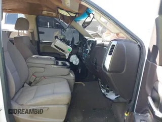 2018 Chevrolet Silverado 1500 LT with VIN 3GCUCRER0JG286336, listed as a IAAI auction lot 41738980 with 124,612 mi miles and . Bid and sale history available at DreamBid. Image 5.