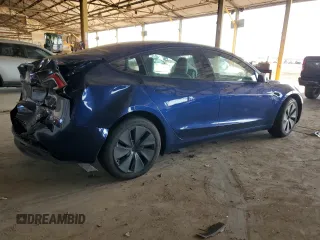 2025 Tesla Model 3 Long Range with VIN 5YJ3E1EA7SF880270, listed as a Copart auction lot 49733925 with 7,542 mi miles and Salvage Title. Bid and sale history available at DreamBid. Image 3.