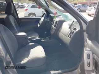 2006 Ford Escape XLT with VIN 1FMYU93126KC36402, listed as a IAAI auction lot 42122882 with 192,899 mi miles and . Bid and sale history available at DreamBid. Image 5.