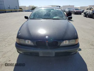 1999 BMW 5 Series 540i z VIN WBADN6341XGM64045, wystawiony jako Copart lot #58277545 z przebiegiem Nie podano mil oraz Czysty tytuł • Clean title. Historia ofert i sprzedaży dostępna na DreamBid. Obrazek 5.
