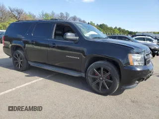2013 Chevrolet Suburban LT with VIN 1GNSKJE76DR102183, listed as a Copart auction lot 56272494 with 122,679 mi miles and Non Repairable. Bid and sale history available at carsss.com. Image 4.
